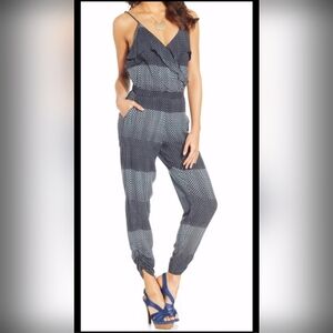 NWOT Jessica Simpson reads sassy and effortless with ruffled trims,an open-back